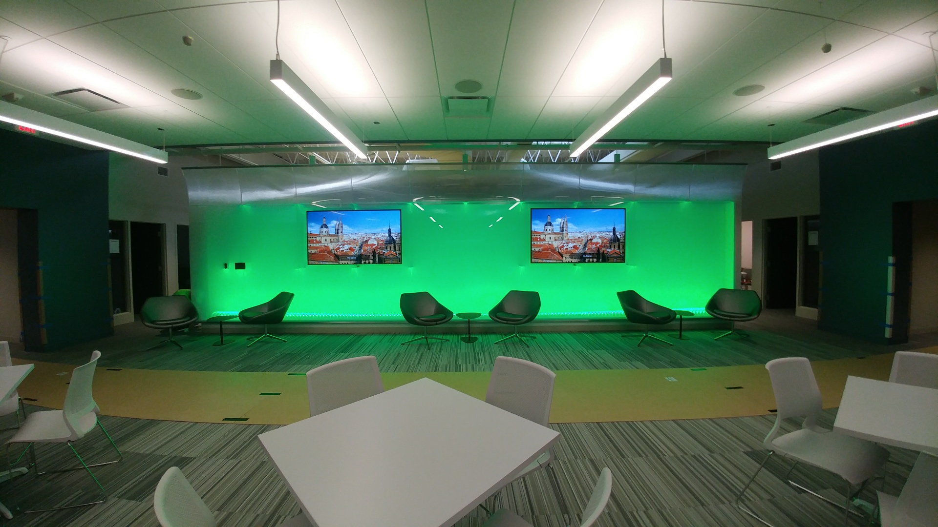 Sitting and collaboration area, with media screens, AANS.